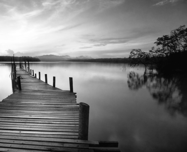 Dawn Breaks Over Still Waters Print