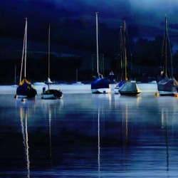 Sailboats and Mooring Buoys at Dusk